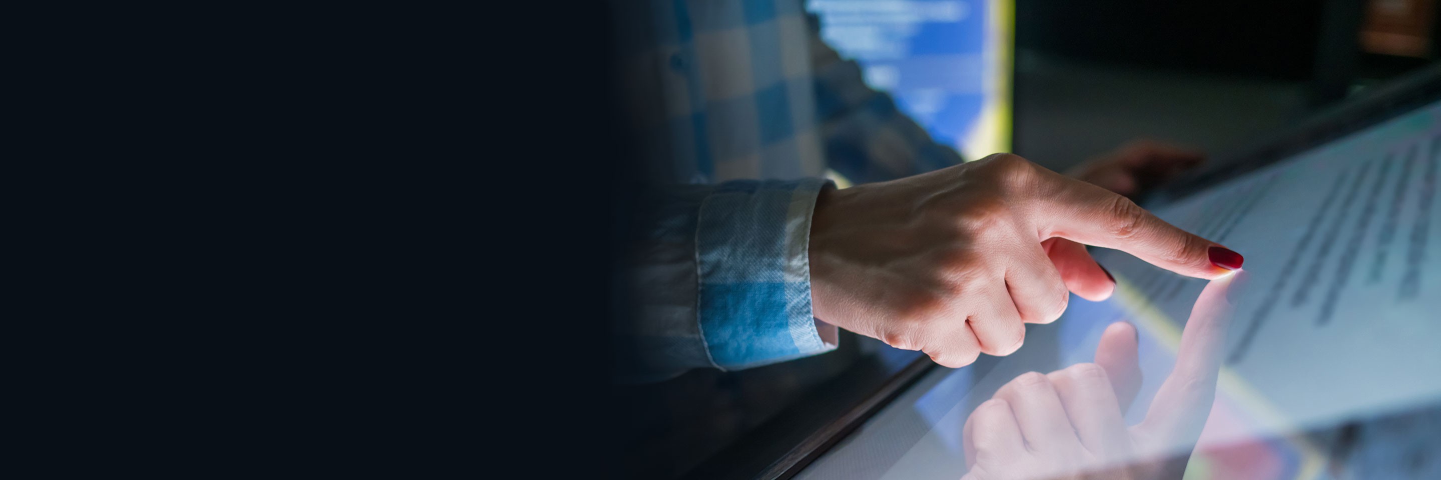 Education, entertainment, learning and technology concept - woman using interactive touchscreen display of electronic kiosk at modern museum or exhibition