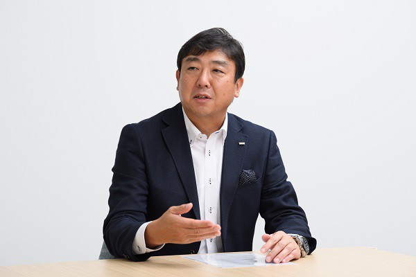 KDDI株式会社 ソリューション事業本部 ソリューション事業企画本部 マーケティング部 マネージャー 湶 大輔の写真